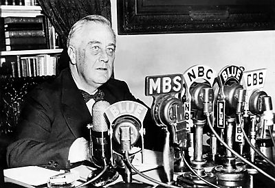 Franklin D. Roosevelt at the White House delivering a national radio address