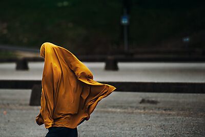 Muslim Woman in Yellow